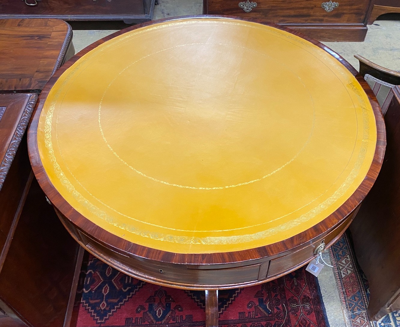 A Regency and later circular mahogany drum table, diameter 106cm, height 75cm